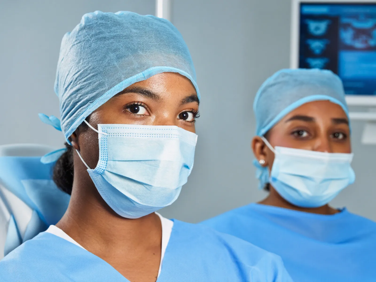An oral surgery team in a modern sterile operatory